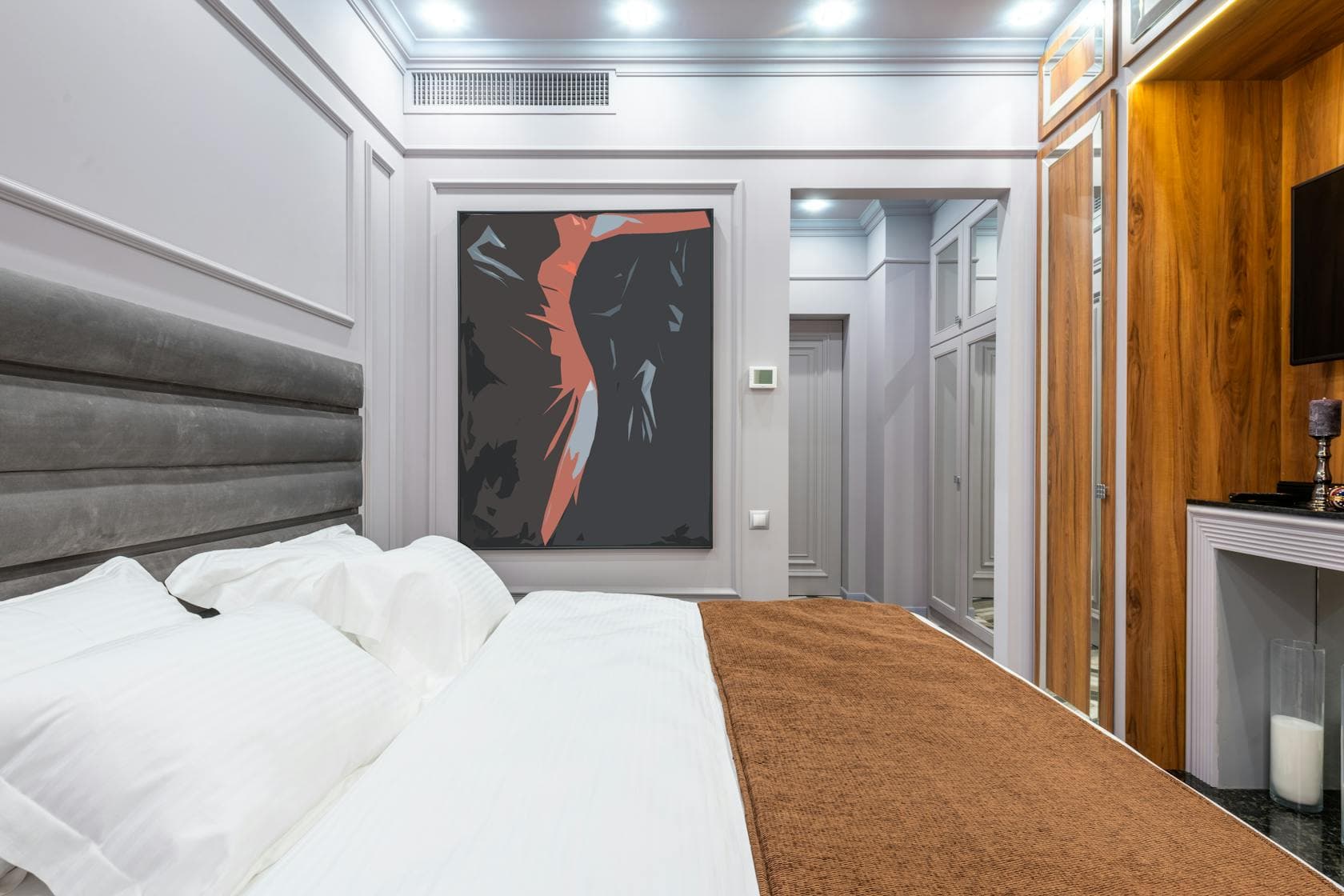 A calm, well-appointed hotel bedroom at dusk